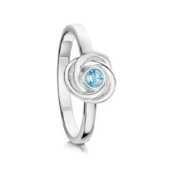 Reef Knot Blue Topaz Ring In Sterling Silver